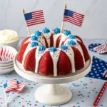 red white blue bundt cake with patriotic decor
