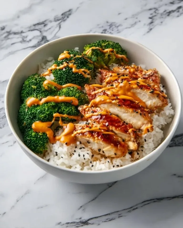 Delicious Sticky Chicken Rice Bowls with tender chicken and colorful veggies