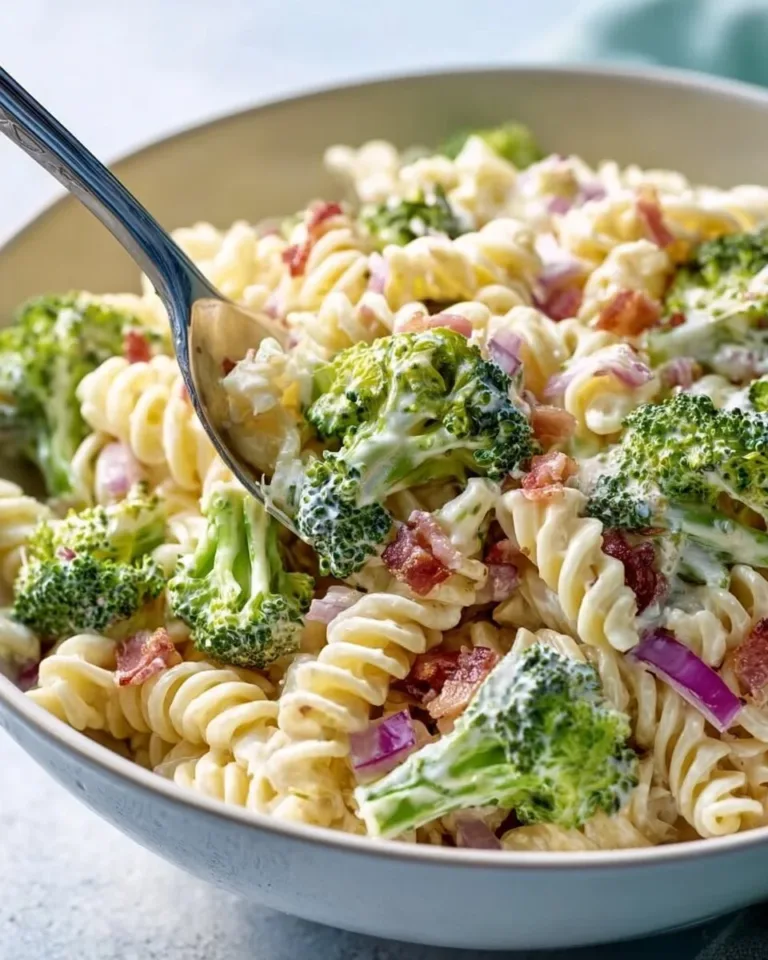 Delicious broccoli pasta salad served in a bowl with colorful vegetables