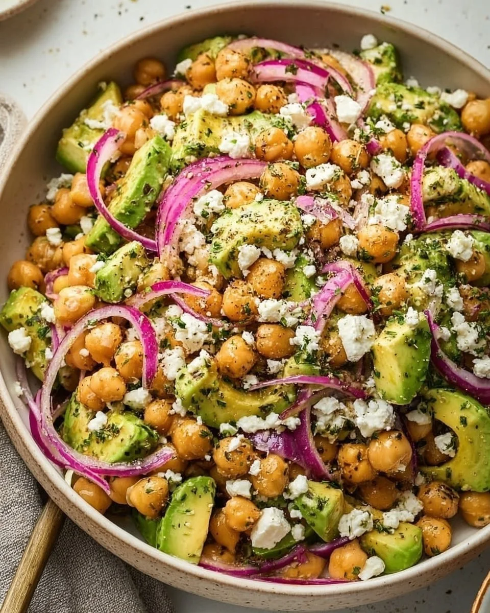 Chickpea Feta Avocado Salad with fresh vegetables and a tantalizing dressing